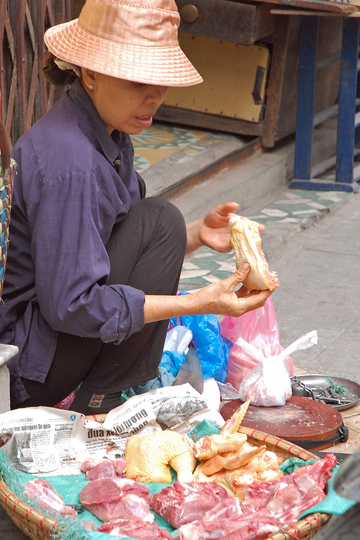 Street vendor selling meats.