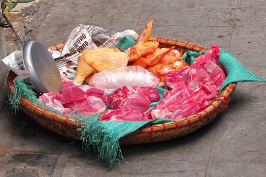 Street vendor's basket of meats.