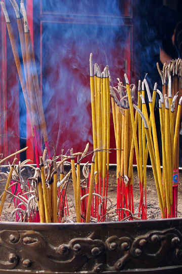 Josh Sticks in front of temple.