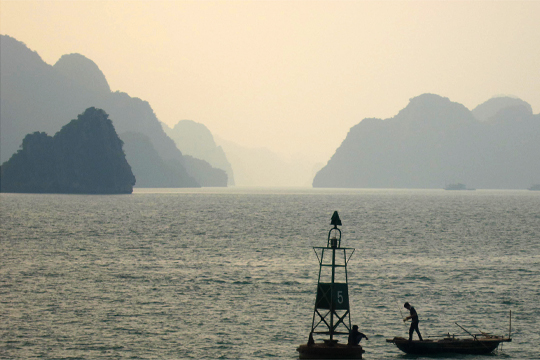 Fishers tied up at buoy.