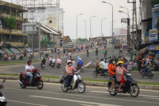Bridge leading into the Chinatown area, Saigon.