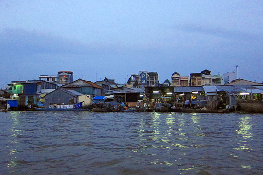 The river-front is waking up, Can Tho.