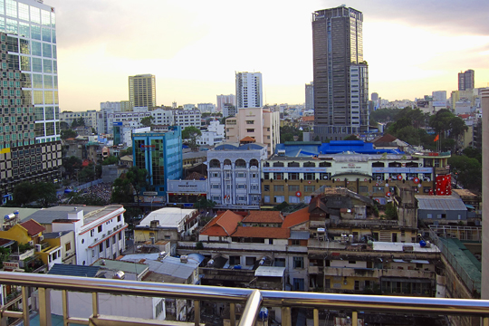 Dusk view of the skyline, Saigon Saigon Bar. Caravelle Hotel, Saigon.