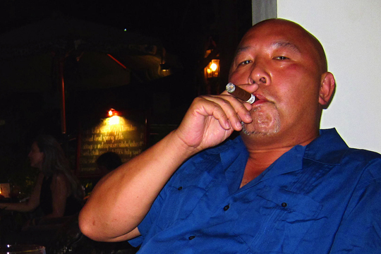 After-dinner cigar at the Hoa Tuc Restaurant, Ho Chi Minh City.