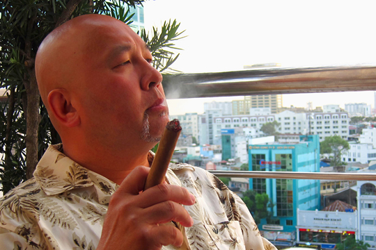 Late afternoon cigar at the Saigon Saigon Bar. Caravelle Hotel, Saigon.