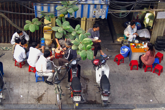 Breakfast-time on Hang Manh Street, Hanoi.