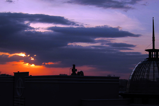 Sunset from the Saigon Saigon Bar. Caravelle Hotel, Saigon.