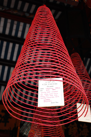 Joss coils burn for 24 hours to carry the message of the attached wish, Hoi An.