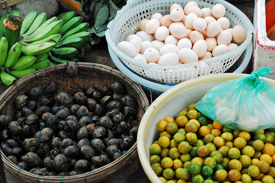 Baskets of food at the central market. Old Town, Hoi An.