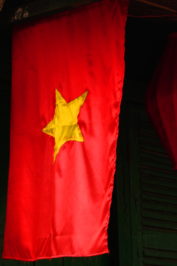 Red on green. Old town, Hoi An.