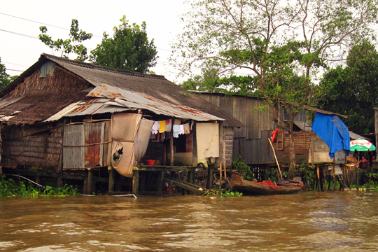 Stilt-houses on the shores of the Mekong near Can Tho.