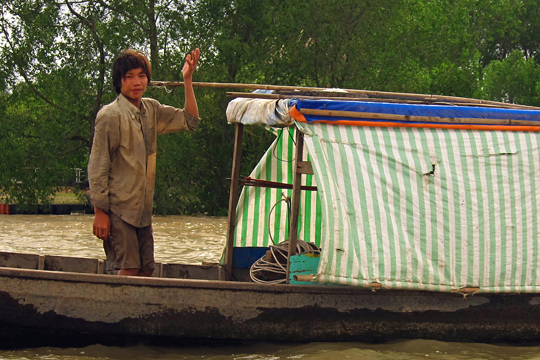 More friendly folks on the Mekong, near Can Tho.