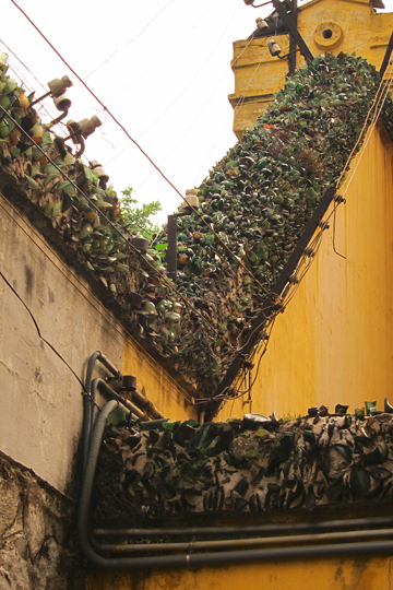 Glass shard-topped walls at the Hanoi Hilton.
