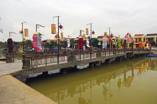 Pedestrian Bridge over Thu Bon River canal. Old Town, Hoi An.