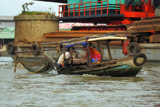 Small fishing boat. Mekong near Can Tho.