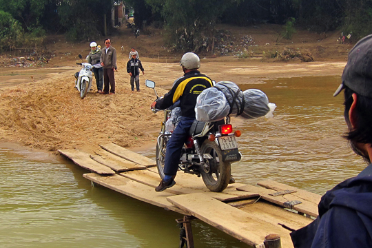 Then Duc rides off, Central Highlands.