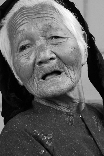 The net-mender, fishing village near Hoi An.