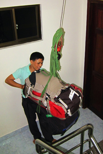 Our luggage arrives on the floor, Saigon.