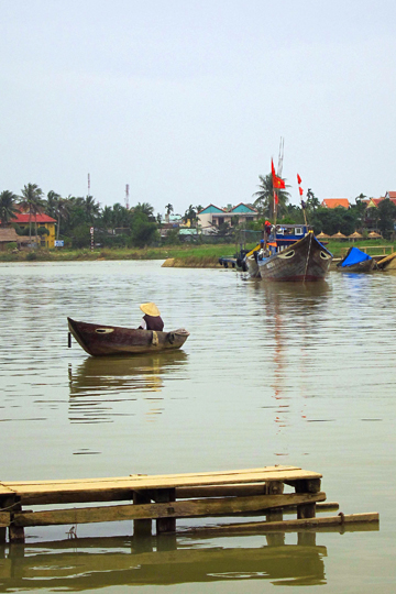 Small sampans on the Thu Bon River. Old Town, Hoi An.