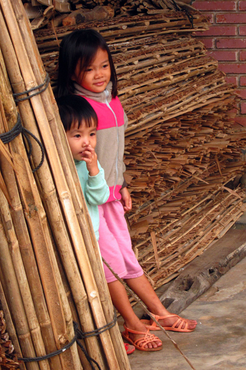 Shy kids, fishing village near Hoi An.