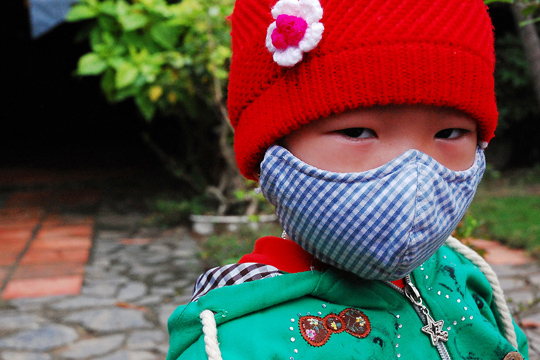 Suspicious kid, fishing village near Hoi An.