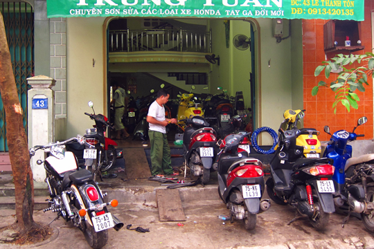 Motorcycle repair shop, Hue.