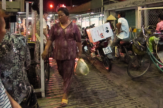 Boarding the river ferry, Can Tho.