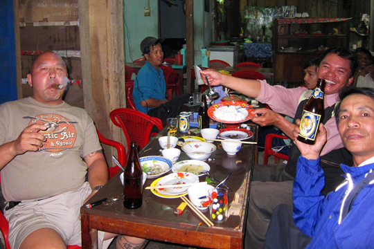 After-dinner cigar and drinks, Prao.