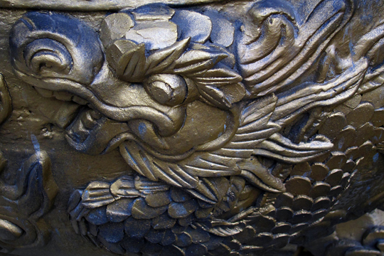 Dragon relief on urn, Hoi An.