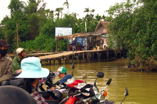 The ferry takes us back across to the Hoi An side of the river.