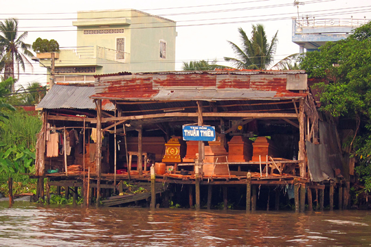 Casket sales on the Mekong near Can Tho.
