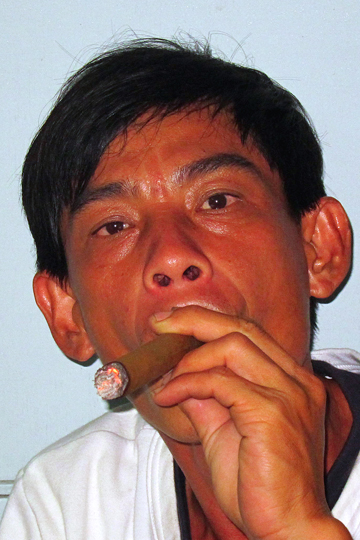 Long's other friend... inhaling, Cam Tu.