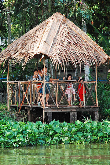 Excited to see us, near Can Tho.