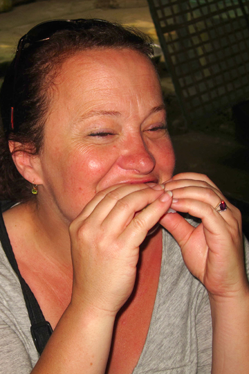 Eron enjoying a rice paper snack, Quang Nam Prov.