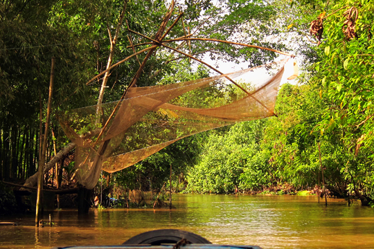 Fishing nets over the canal, near Can Tho.