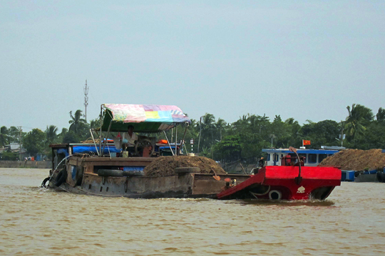 Almost awash on the Mekong, near Can Tho.