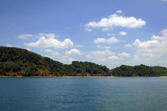 Motoring along the Koh Jum shore.