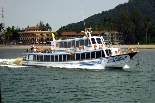 Our vessel's counterpart leaving Koh Lanta.