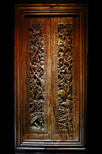 Elaborately carved wooden panel.