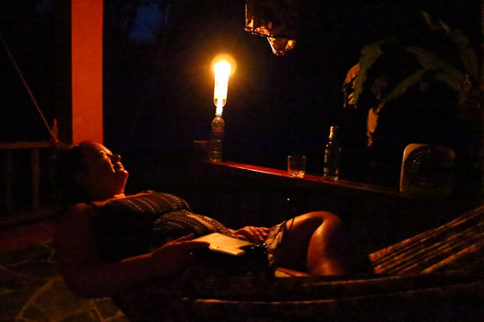 Enjoying the veranda by candle-light.