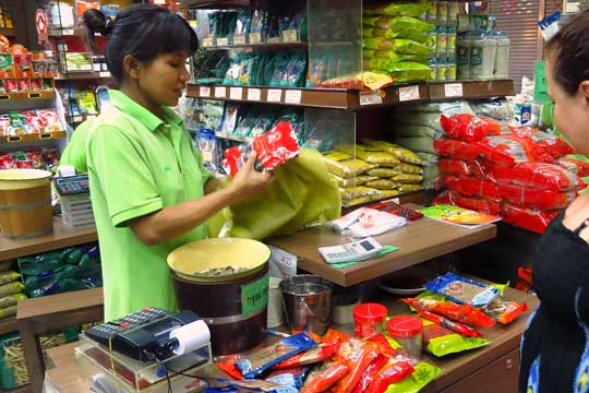 Ringing up our haul of spices.