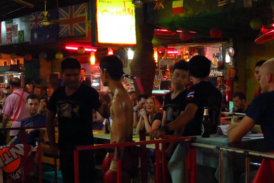 The first fighter arrives at ringside.