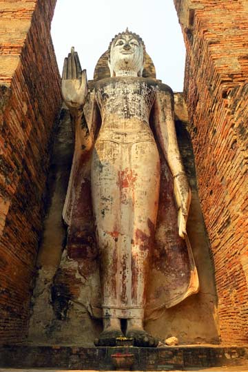 Giant standing Buddha on south side of Wat Mahathat.