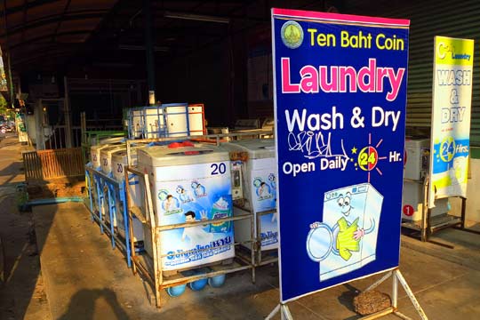 24/7 outdoor coin-operated laundromat.