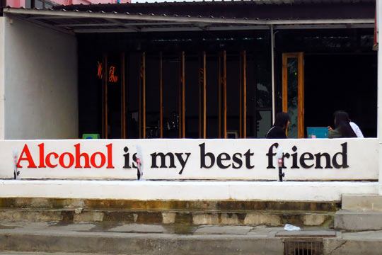 Sign on the front of the White Bar.