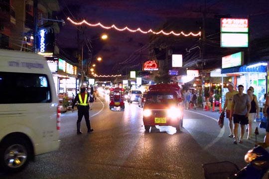 Traffic Policeman directing flow at entrance to the market.